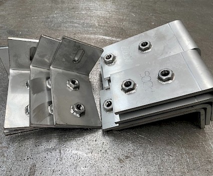 Stainless angles with TIG welded nuts